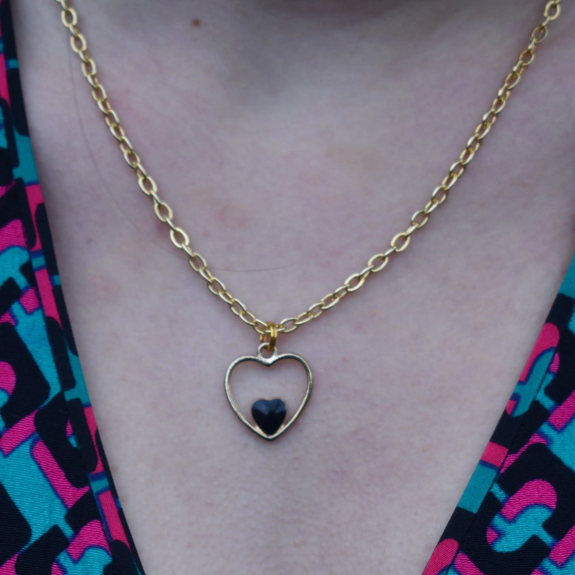 Black heart enamel pendant necklace on 18 inch gold plated chain - Memoriex