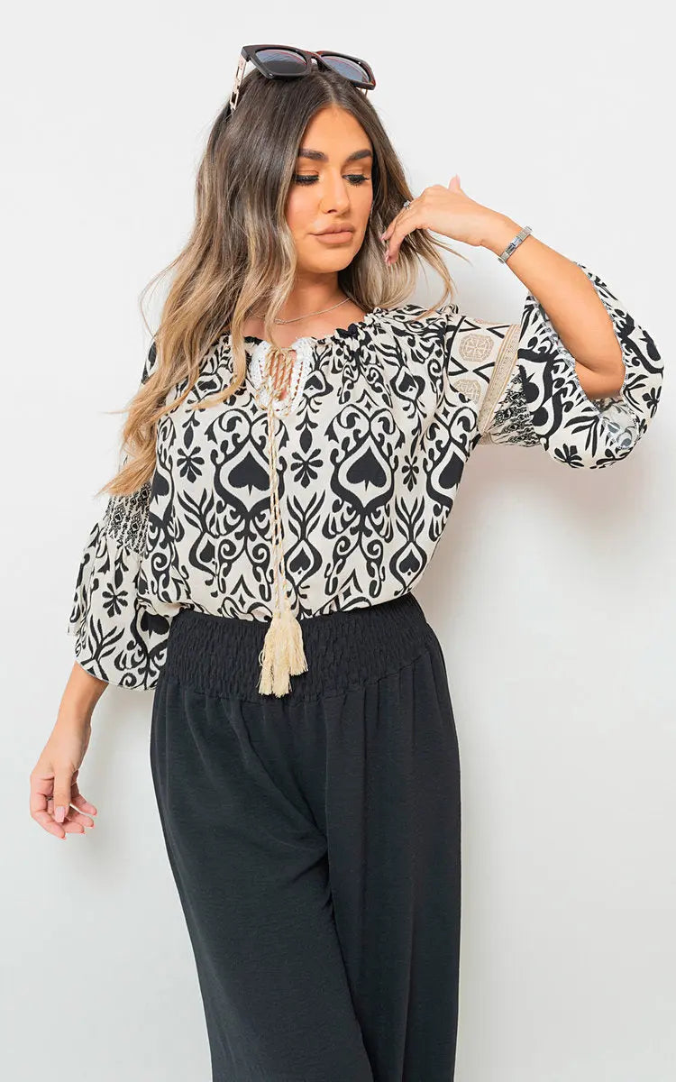 Boho Printed Tassel Tie Neck Long Sleeve Loose Tops-0