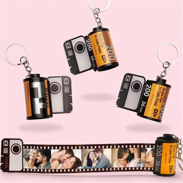 Memoriex Boutique Cinematic Memories Keyring showing a retractable film roll with custom personal photographs.