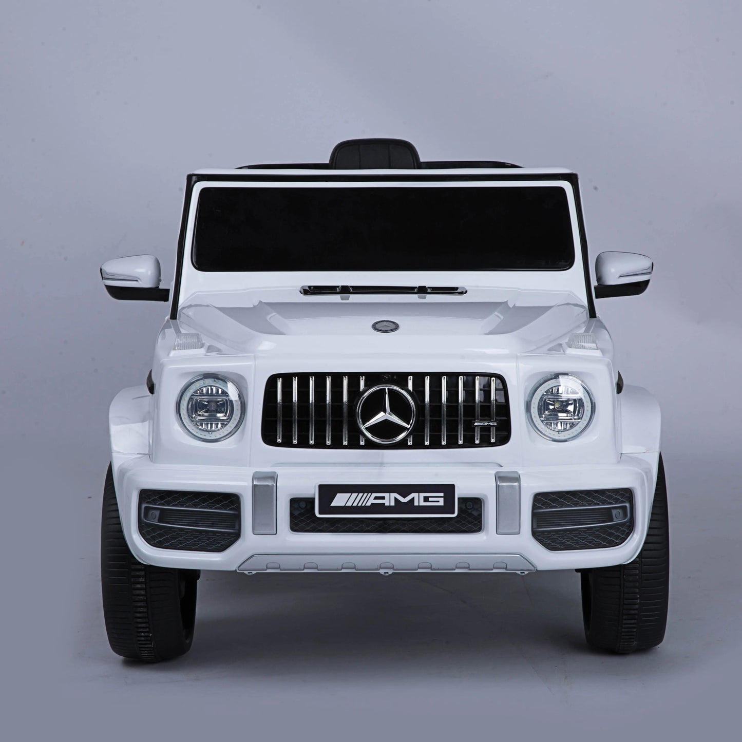 Mercedes Benz G63 Children's Electric Vehicle with Remote Control 12V Music, Horn, Spring Suspension, Safety Lock and License - Memoriex 