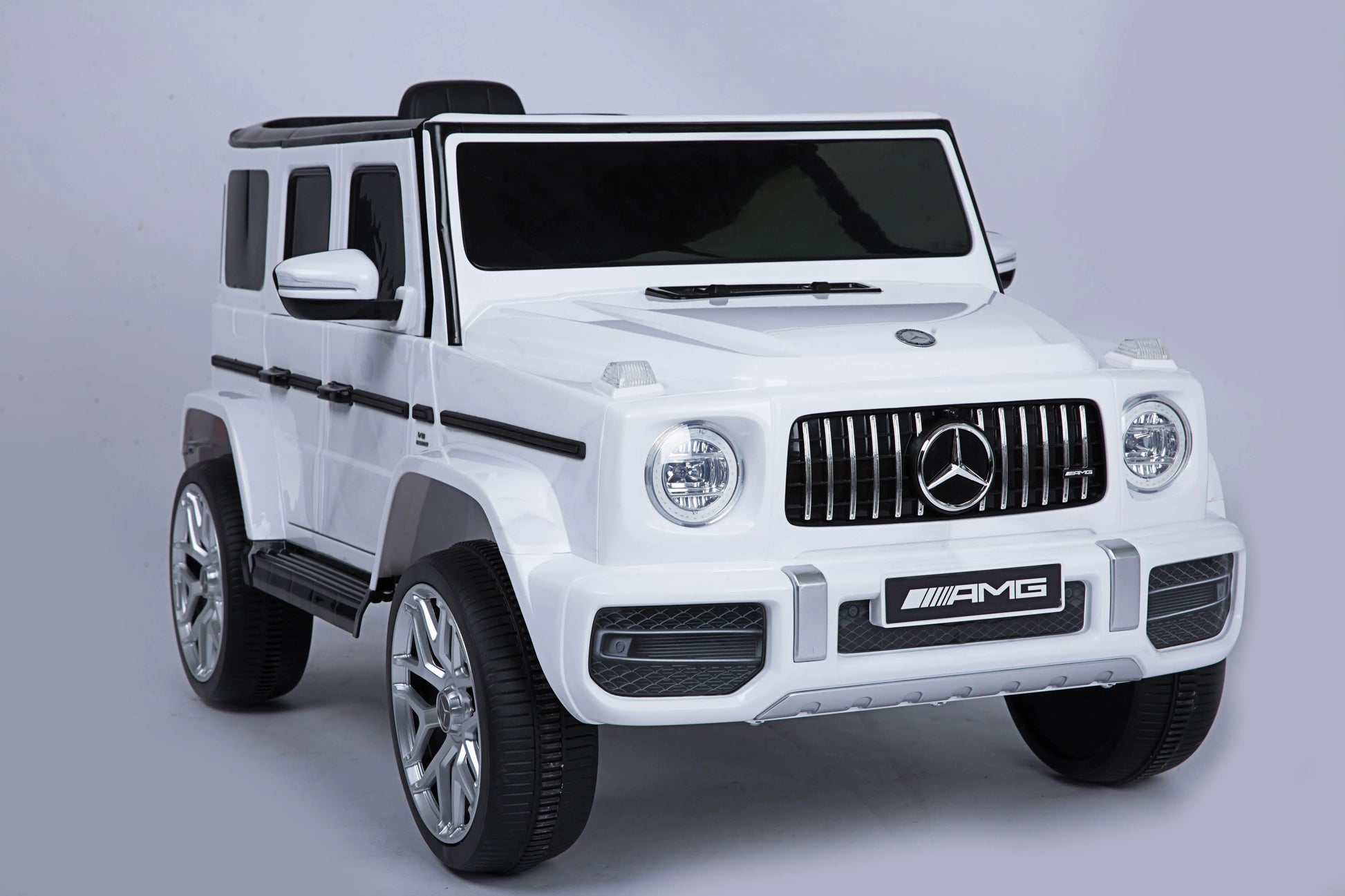 Mercedes Benz G63 Children's Electric Vehicle with Remote Control 12V Music, Horn, Spring Suspension, Safety Lock and License - Memoriex 