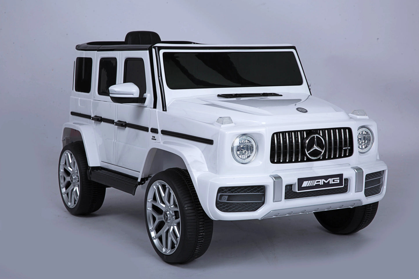 Mercedes Benz G63 Children's Electric Vehicle with Remote Control 12V Music, Horn, Spring Suspension, Safety Lock and License - Memoriex 